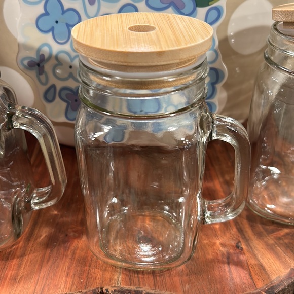 3 glass mugs with wooden tops. Has a hole for a straw. Never used. 🍺🍺 - Picture 2 of 4